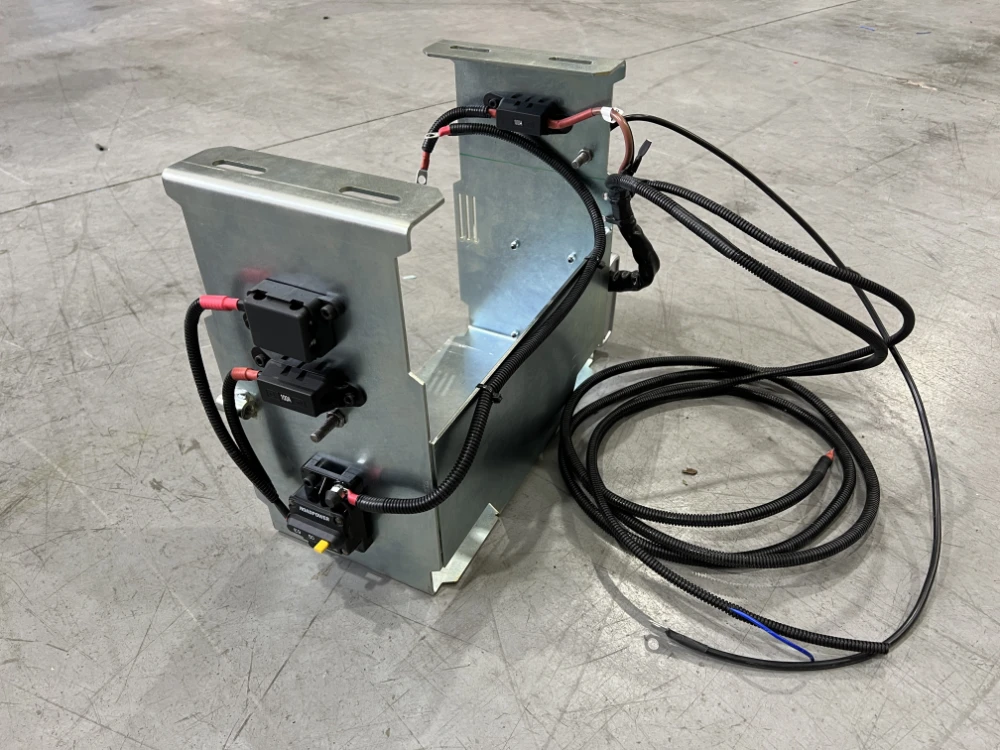 Team installing a dual battery system on a traffic control vehicle