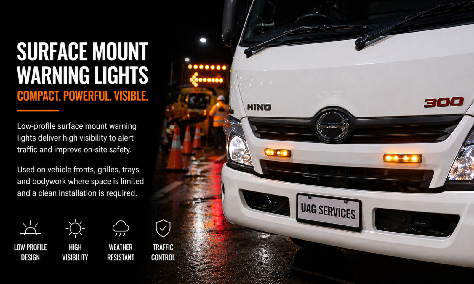 Surface mount amber LED warning lights installed on front grille of traffic control vehicle at night worksite